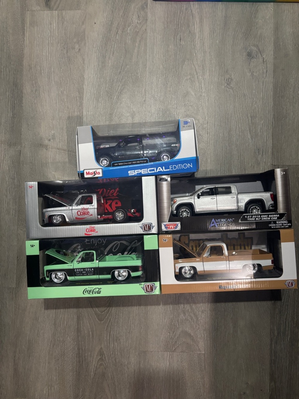 Coca Cola Die-Cast Truck Collection in Purple, Green, White, Silver and Brown